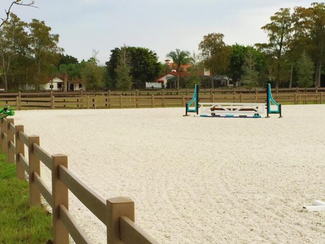 Horse riding arena fence height